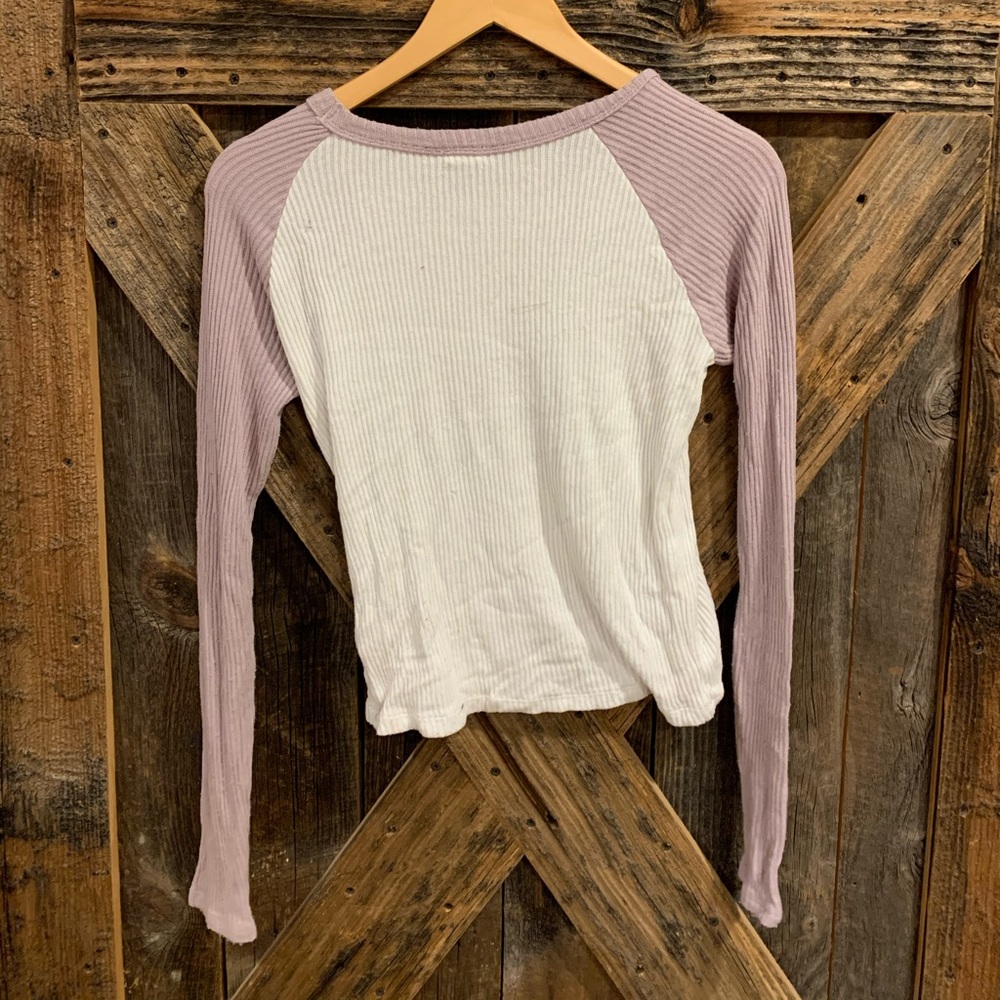 White and purple long sleeved sweater top